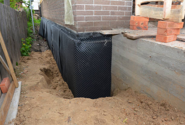 Happy homeowners after waterproofing job in Norwalk